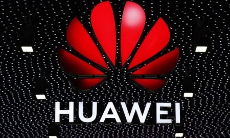 Huawei logo stands